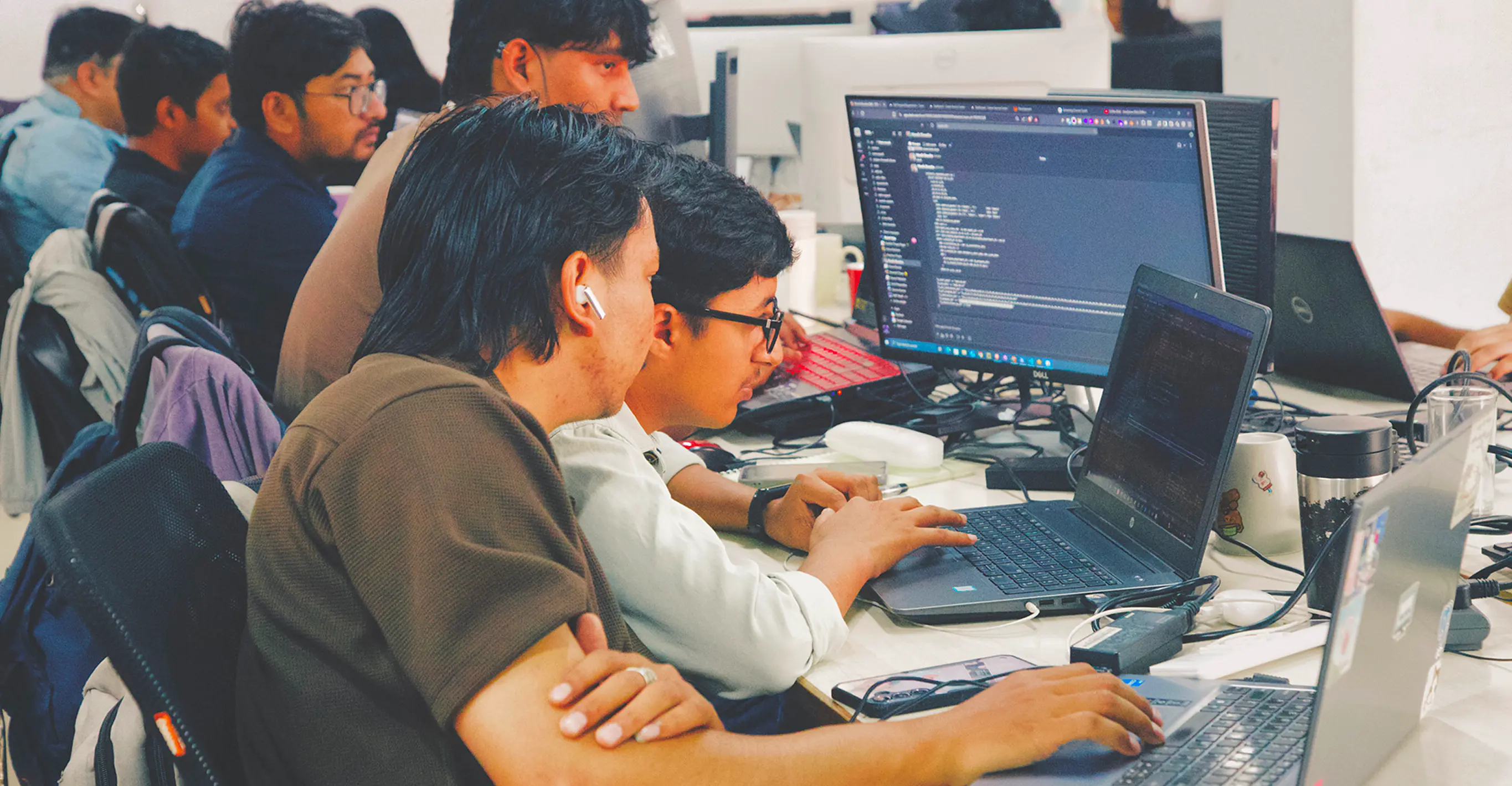 two-guys-looking-at-computer